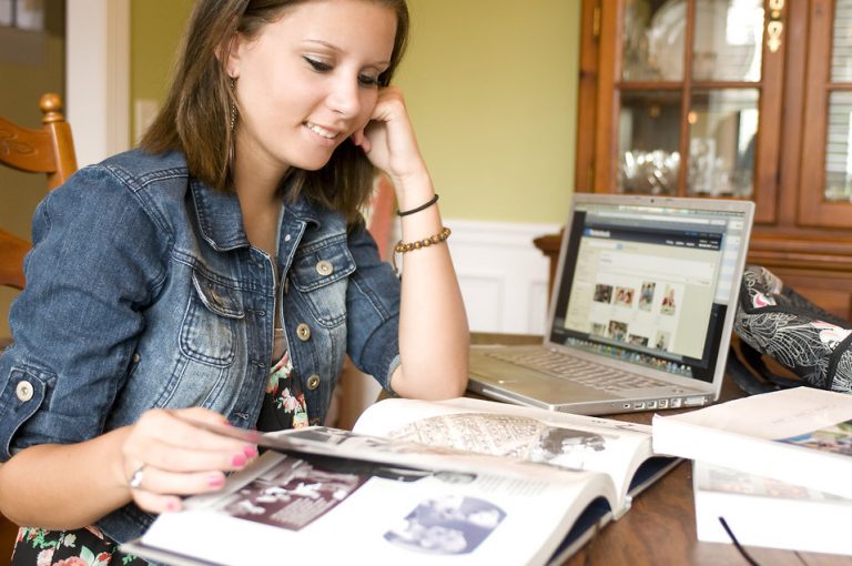 15994-a-female-student-reading-a-book-pv